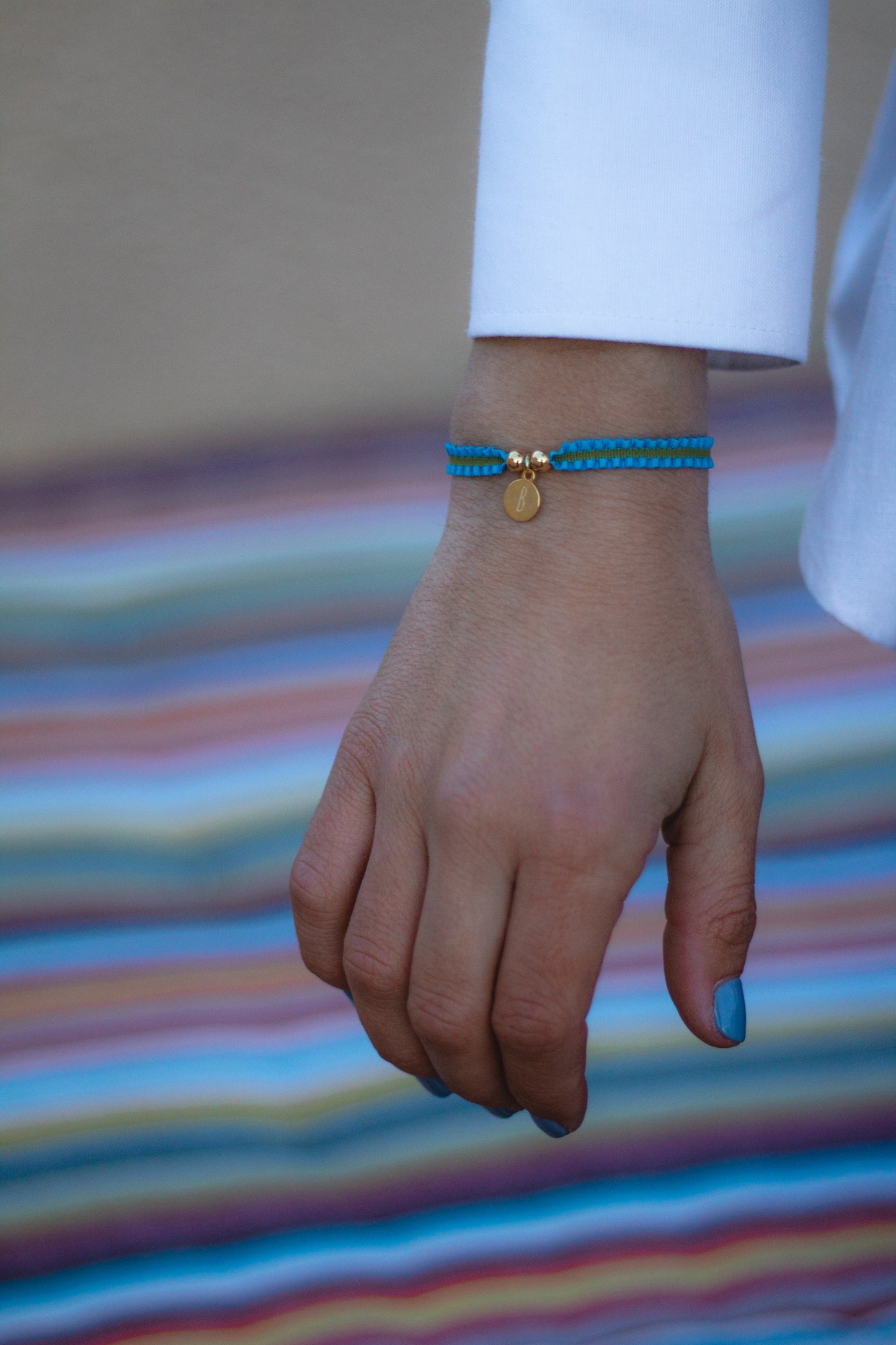 Pulsera bicolor inicial